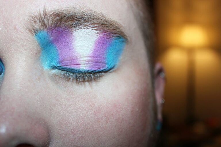 Trans flag painted on eyelid