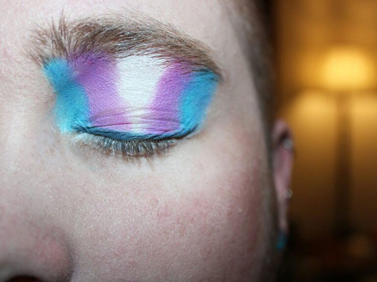 Trans flag painted on eyelid
